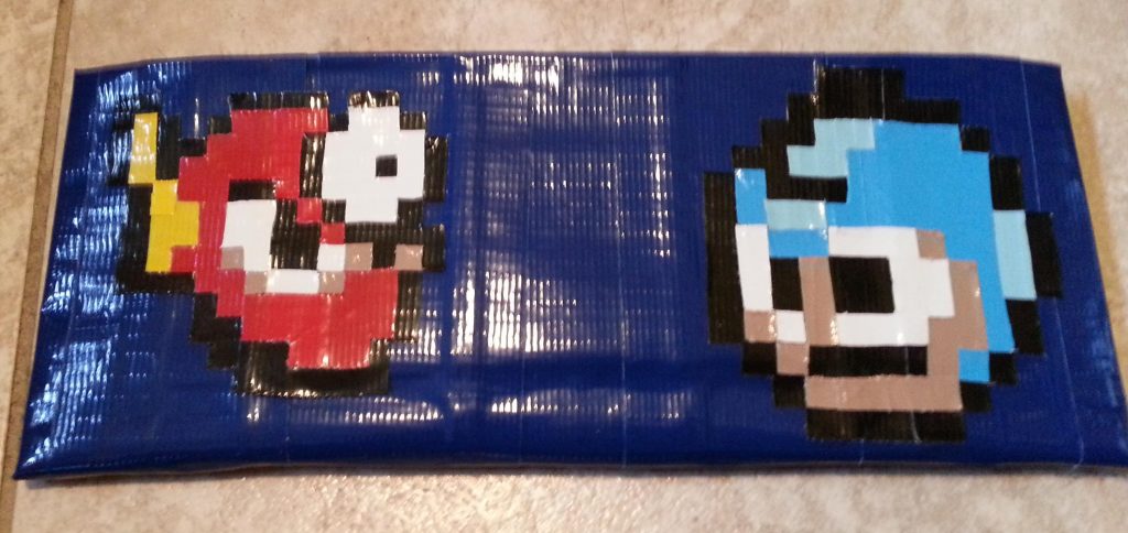 Made this for a commission. It features Megaman's head and Metalman's head (both 8-bit).